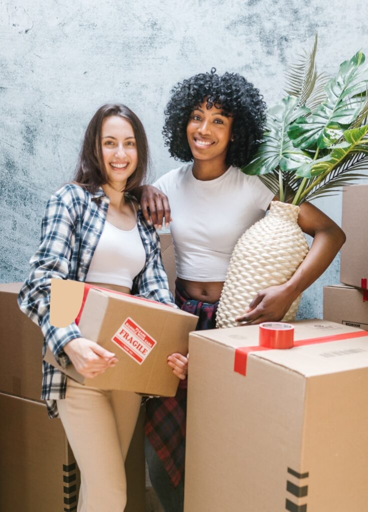 Couple surrounded by moving boxes | home loans